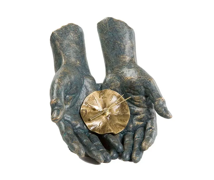picture 1 Unique desk decoration – clock laying in hands!