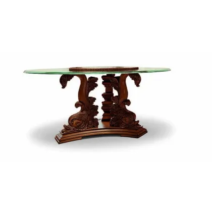 Zdjęcie Stylowy antyczny stół ze szklanym blatem i rzeźbioną podstawą