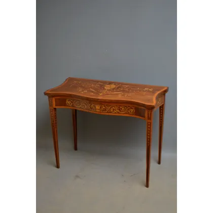 Picture Edwardian Sheraton Revival mahogany and inlaid gaming table, with finely inlaid serpentine top