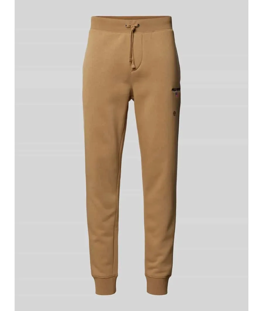obrazek 1 Spodnie dresowe o kroju slim fit z wyhaftowanym logo