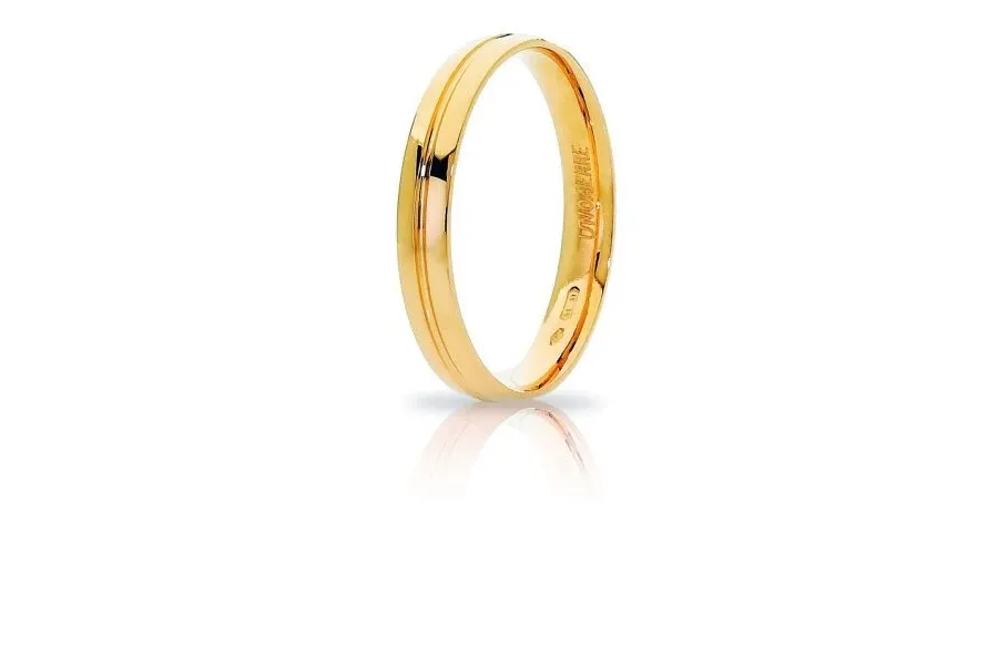 obrazek 1 Stylowa obrączka z żółtego złota z brylantem szer. 3,20mm