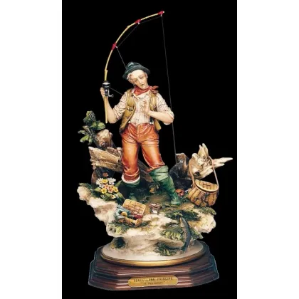 Zdjęcie Porcelanowa ozdoba do salonu - statuetka wędkarza