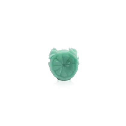 Zdjęcie Świeczka w kształcie cytrusa w kolorze zielonym – marka Daum