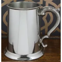 Picture Exclusive beer mug with a decorative handle