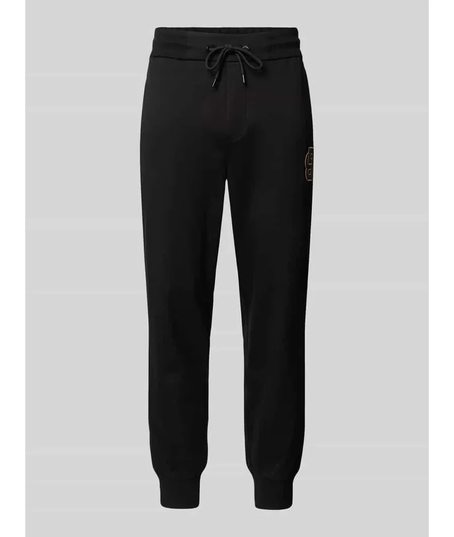 obrazek 1 Spodnie dresowe o kroju relaxed fit z naszywką z logo model ‘Lamont’