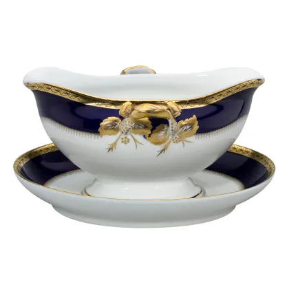 Picture Porcelain sauce boat with a Brest stand with a golden plant motif - Vista Alegre