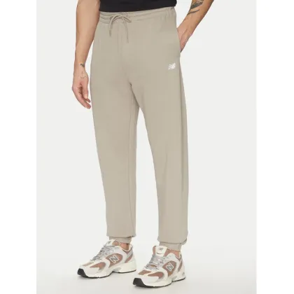 Zdjęcie New Balance Spodnie dresowe Essentials MP41519 Beżowy Relaxed Fit