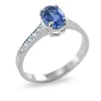 Picture Gold ring with an oval sapphire and diamonds on a stem