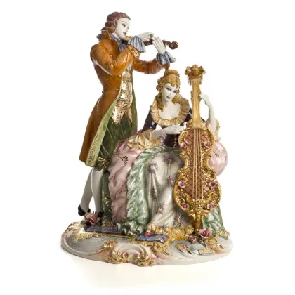 Zdjęcie Barokowa figurka pary grającej na wiolonczeli i skrzypcach wykonana z ceramiki - Ceramiche ML