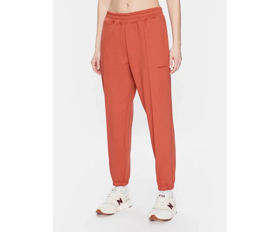 obrazek 1 New Balance Spodnie dresowe Athletics Nature WP23553 Pomarańczowy Relaxed Fit