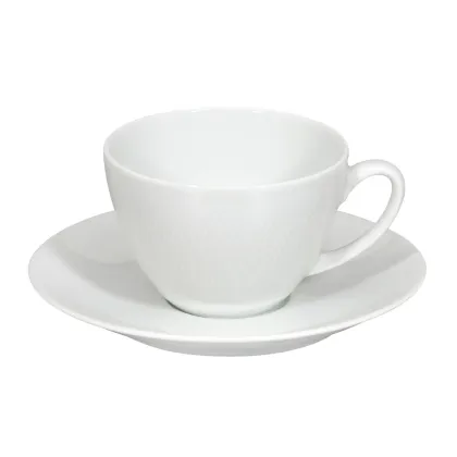Picture Spirit White porcelain tea cup and saucer from a collection with curved lines flowing through each element - Vista Alegre