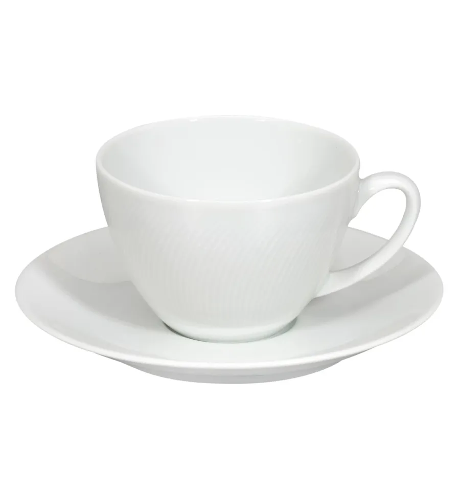 obrazek 1 Porcelanowa filiżanka do herbaty ze spodkiem Spirit White z kolekcji posiadającej zakrzywione linie płynące przez każdy element - Vista Alegre