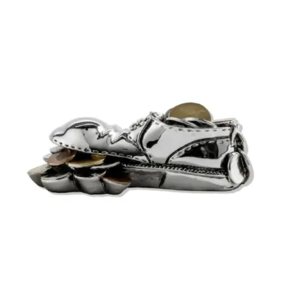 Picture A unique silver amulet in the shape of a torn shoe