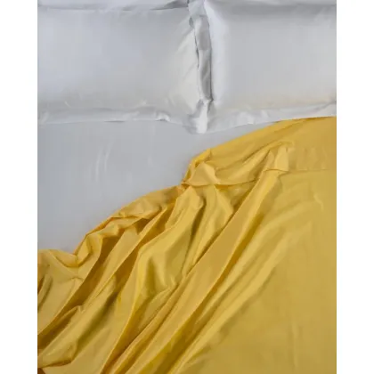 Zdjęcie Włoskie prześcieradło w kolorze żółtym do sypialni