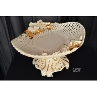 Picture A tasteful ceramic plate with decorations