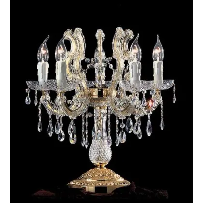 Zdjęcie Stylowa lampa stołowa z pozłacaną metalową ramą pokrytą przezroczystymi szklanymi ramionami i przezroczystymi kryształowymi zawieszkami - Il Paralume Marina