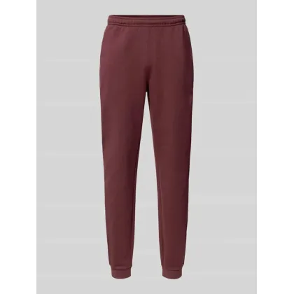 Zdjęcie Spodnie dresowe o kroju tapered fit z nadrukiem z logo model ‘HERITAGE’