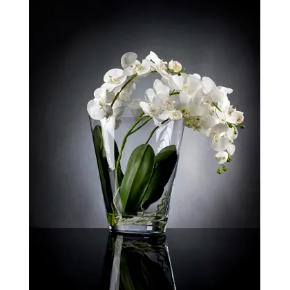 Picture A small glass vase with an artificial flower