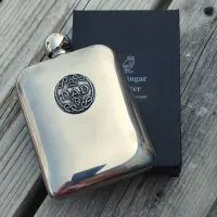 Picture A pewter alcohol flask with a decorative inscription