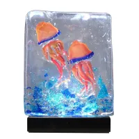 Zdjęcie Dekoracyjna rzeźba, akwarium z meduzą i podświetlaną podstawą LED