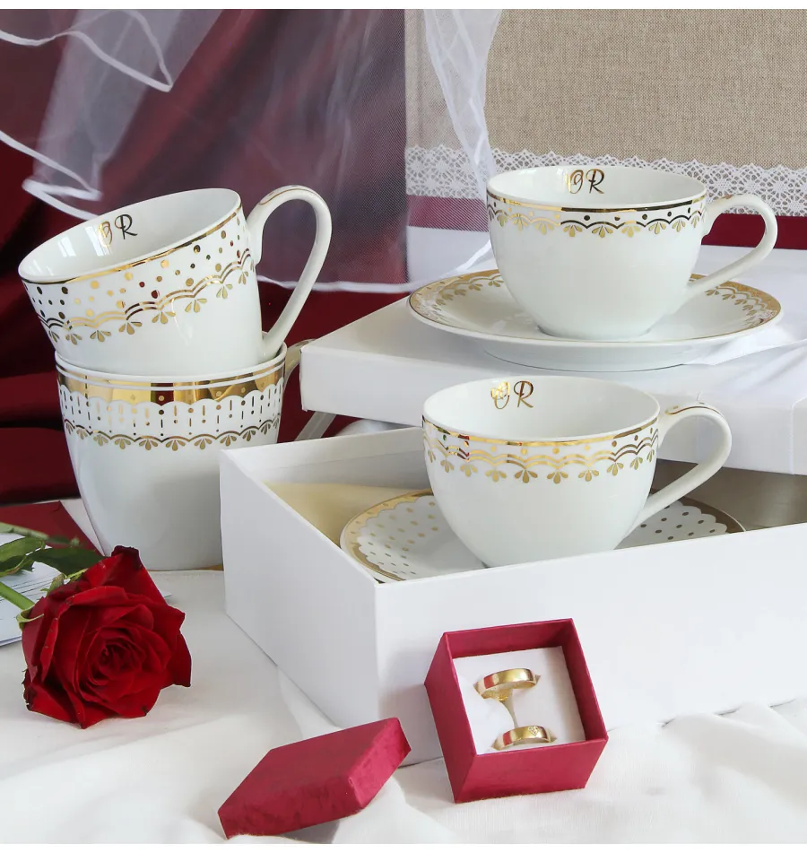 obrazek 2 Stylowa filiżanka ze spodkiem z porcelany zdobiona subtelnym złotym motywem - wariant 3 – Leander