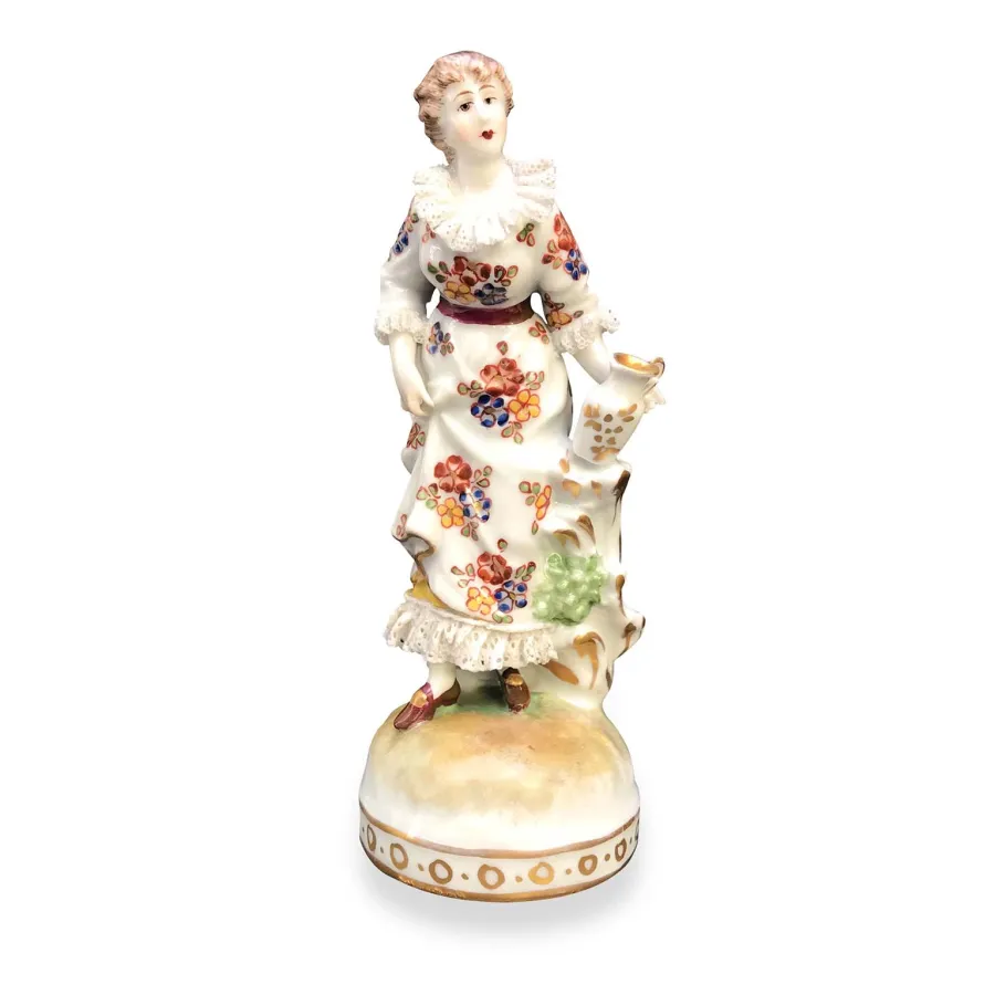 obrazek 1 Porcelanowa figurka kobiety z kwiatowymi dekoracjami