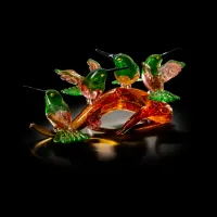 Picture A beautiful amber branch with 4 gold hummingbirds