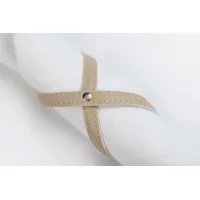 Picture Elite leather napkin rings in a beautiful cappuccino color - for the dining room