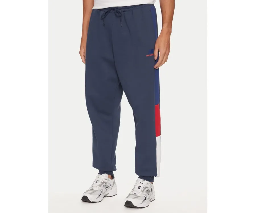 obrazek 1 New Balance Spodnie dresowe MP43522NNY Niebieski Relaxed Fit