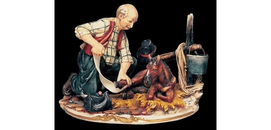 obrazek 1 Piękna porcelanowa figurka weterynarza