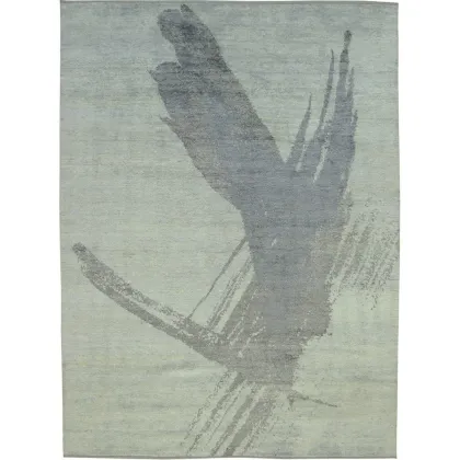 Zdjęcie Jasny dywan z deseniem w kształcie ptasiego pióra