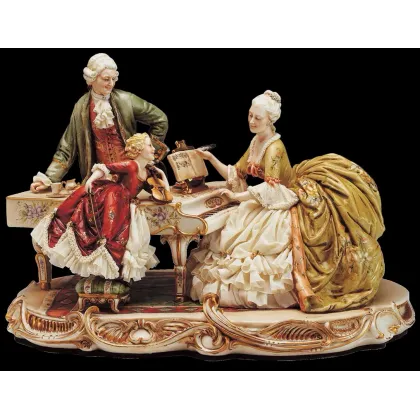 Zdjęcie Kobieta, mężczyzna i dziecko przy fortepianie - porcelana z Włoch