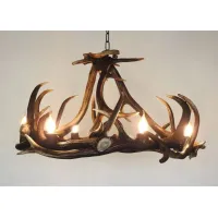 Picture A deer antler chandelier suitable for rooms with wooden elements