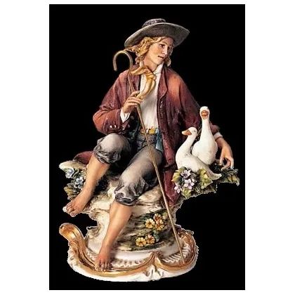 Zdjęcie Porcelanowy mężczyzna pasący gęsi