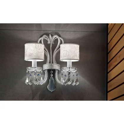 Picture Exclusive wall lamp with a metal frame decorated with crystals
