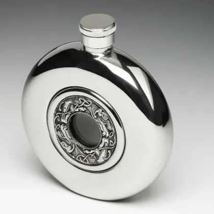 Picture Beautiful, stylish Irish whiskey flask with a glass center