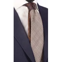 Picture A unique, men's checkered tie in brown and beige colors, with a contrasting knot