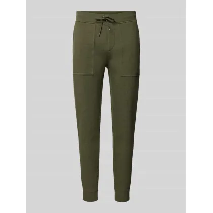 Zdjęcie Spodnie dresowe o kroju slim fit z nakładanymi kieszeniami