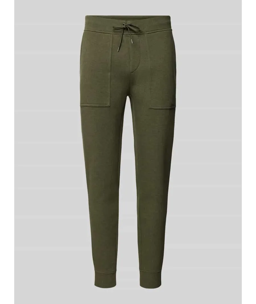 obrazek 1 Spodnie dresowe o kroju slim fit z nakładanymi kieszeniami