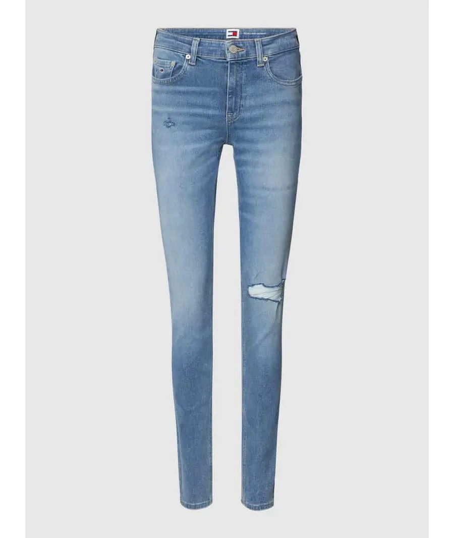 obrazek 1 Jeansy o kroju skinny fit z przetarciami model ‘NORA’