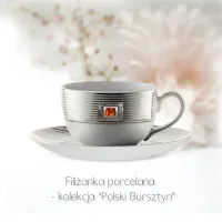 Zdjęcie Porcelanowa filiżanka ze spodkiem zdobiona filigranem z bursztynem.