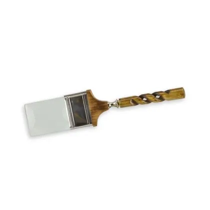 Picture A magnifying glass with a unique brush-shaped handle