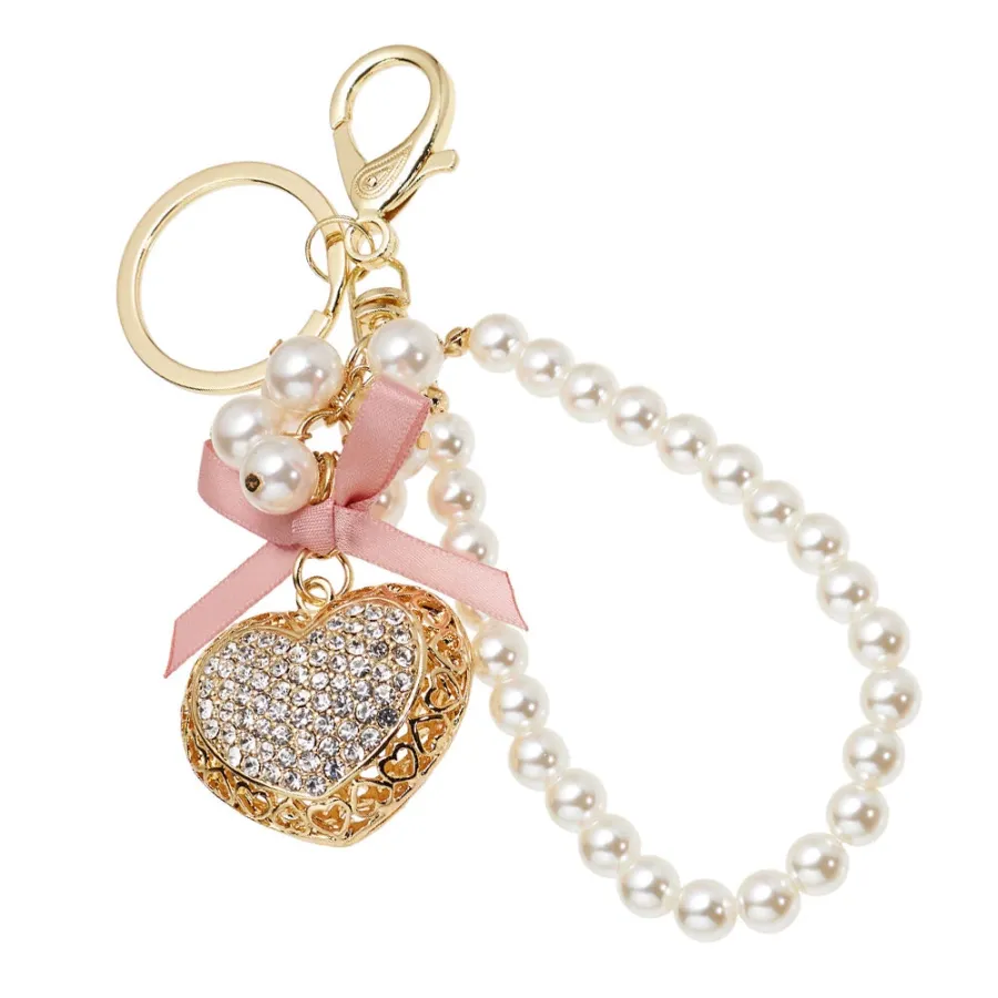 obrazek 1 Niepowtarzalny złoty brelok do kluczy z kryształkami, koralikami i kokardką