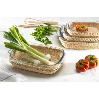 Picture Basket for a rectangular baking dish made of natural wicker, containing Pyrex glass