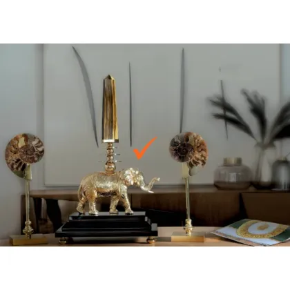 Picture Decorative sculpture on an ebony base with a tiger's eye