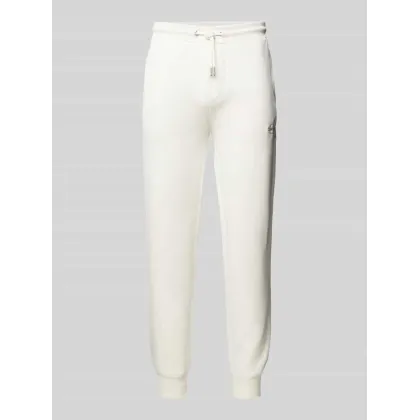 Zdjęcie Calvin Klein Jeans Spodnie dresowe Monologo Hwk Pant J30J325658 Écru Regular Fit