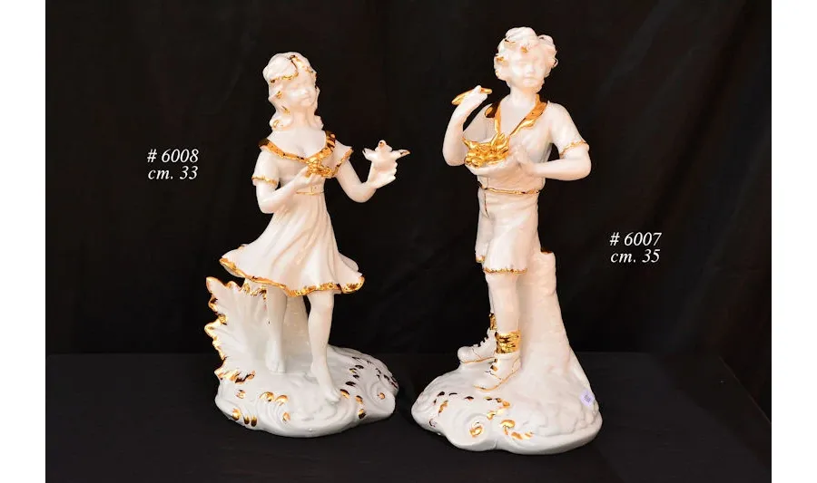 picture 1 Ceramic figurines of boy and girl