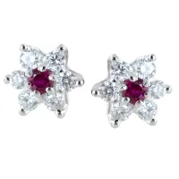 Picture Italian earrings in the shape of diamond stars with rubies