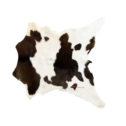 Zdjęcie Dywan skórzany w odcieniach brązowych i białych
