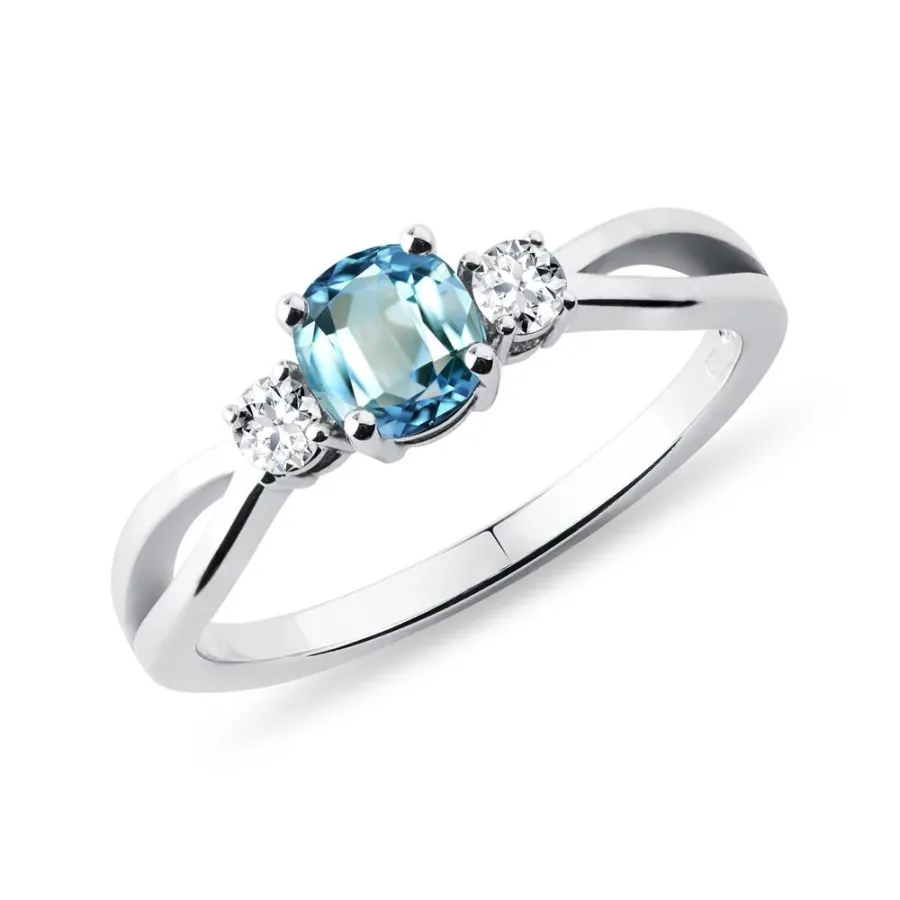 obrazek 1 Pierścionek z białego złota z topazem Swiss Blue i diamentami KLENOTA